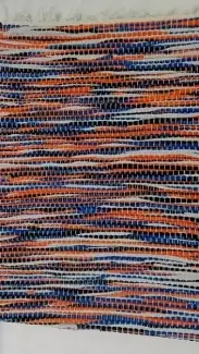 Ručně tkaný koberec v rozměru 80 x 140 cm