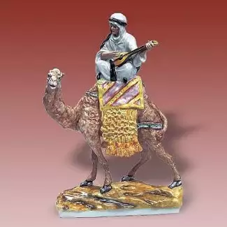 Tradiční figurální porcelán o délce 22,3 cm Arab sedící na velbloudu