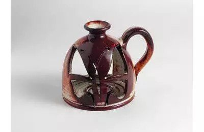 Originální lampička na ruce z ozdobné keramiky III