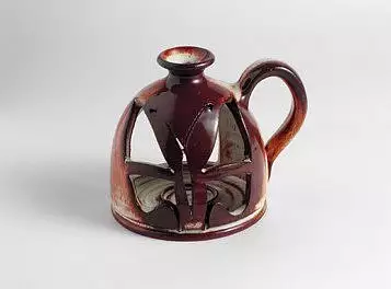 Originální lampička na ruce z ozdobné keramiky III