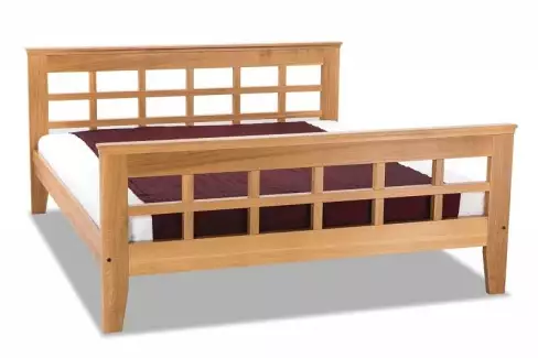 Manželská postel z masivu s vyřezávanými čely LOLA