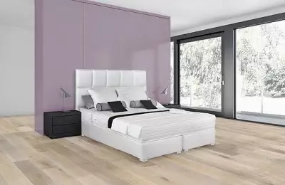 Luxusní celočalouněná postel Kent s vkládanými čalouněnými čtverci s masivním jádrem