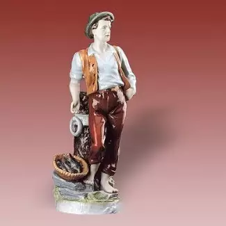 Figurální a ozdobný porcelán o délce 26 cm Muž u studně