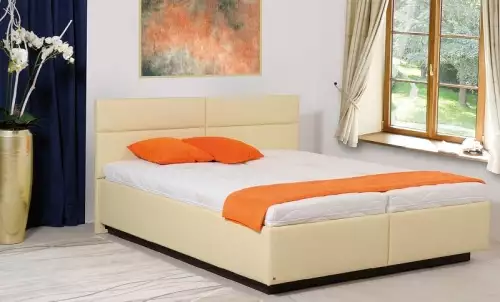 Látkové dvojlůžko s úložným prostorem Nekla