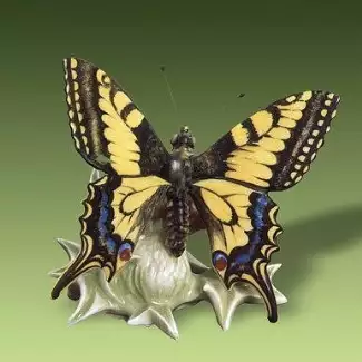 Figura z porcelánu o výšce 9,5 cm Otakárek fenyklový