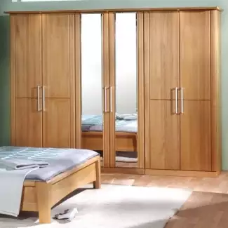 Dvoudveřová až čtyřdveřová masivní skříň do ložnice s vnitřním provedením z lamina Celine
