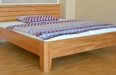 Masivní buková nebo dubová postel v rozměrech 90 x 200 cm až 200 x 200 cm Cynthia Lux